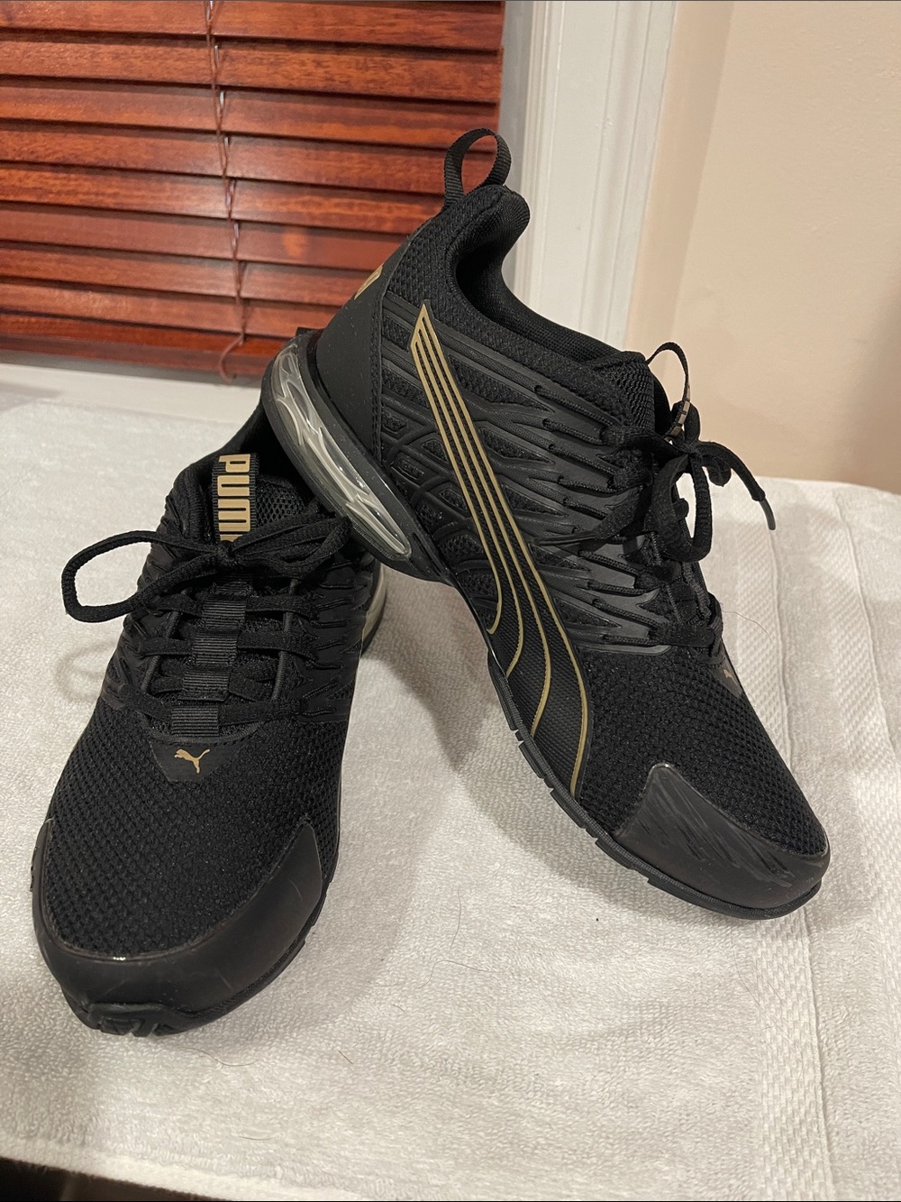 Like New Puma Voltaic Evo Sneakers in Puma Black & Puma Gold - Women’s Size 7